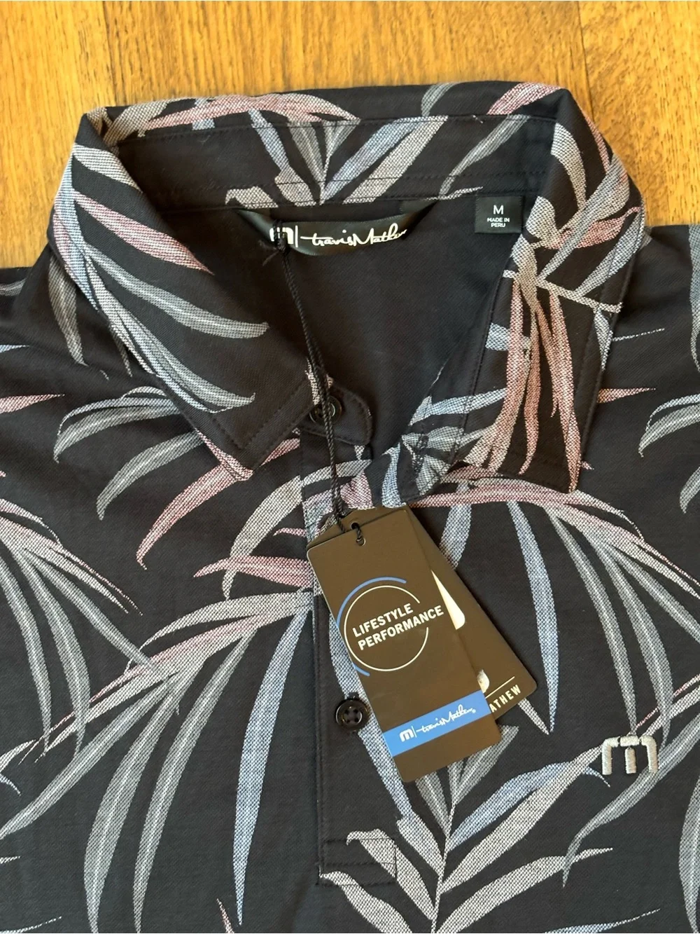 NEW TravisMathew Buzz Words Polo